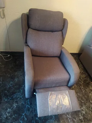 Sillón reclinable motorizado gris