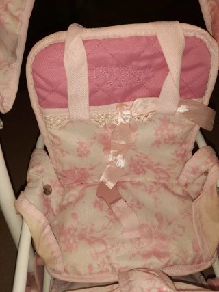 Carrito gemelar rosa con capota