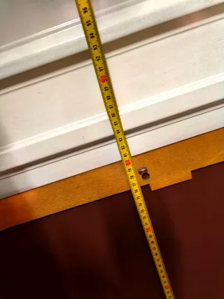 Espejo de madera con marco curvo