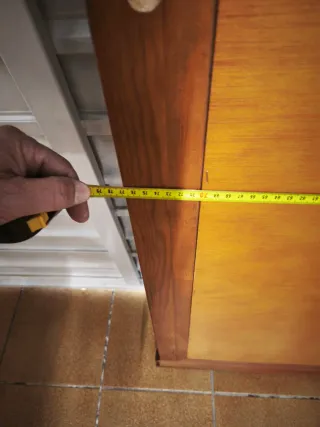 Espejo de madera con marco decorado