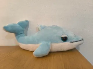 Peluche de delfín azul