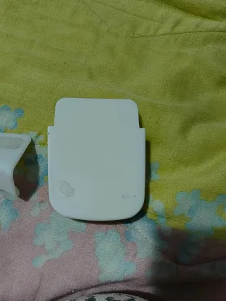 Porta telefono/telecomando e cuffie
