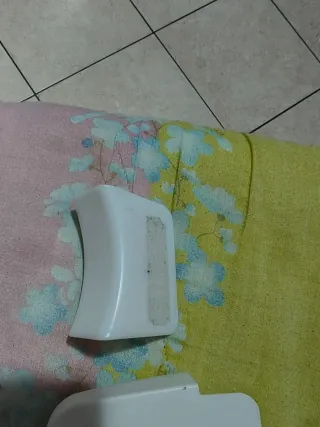 Porta telefono/telecomando e cuffie