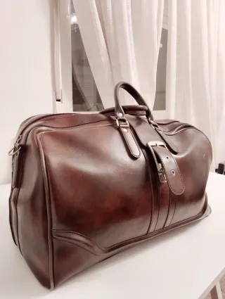 Maleta de viaje de cuero marrón