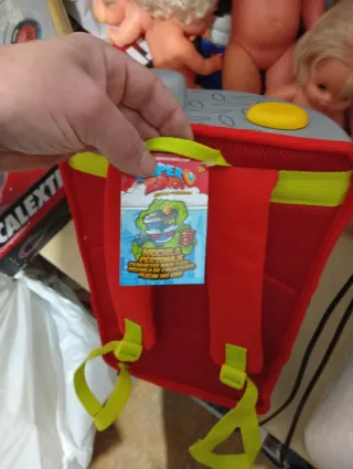 Mochila Super Things y Lata Puzzle la sobre