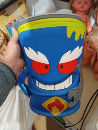 Mochila Super Things y Lata Puzzle la sobre