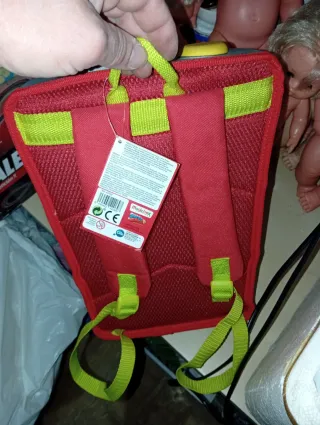 Mochila Super Things y Lata Puzzle la sobre