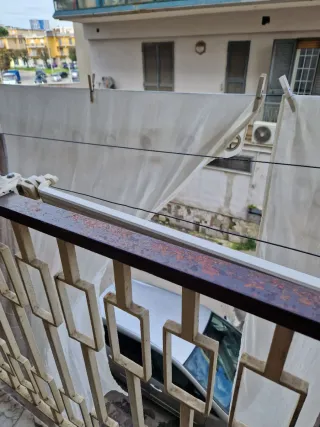 Coppia tende bianche con anelli