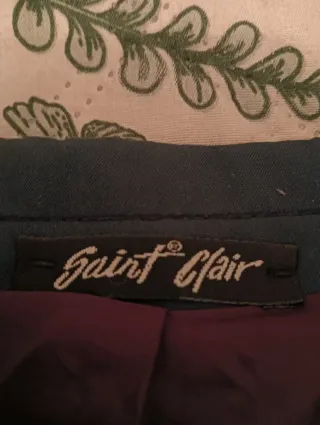 Americana de vestir azul con botones dorados