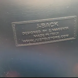 Zaino Justo nero con borchie con piccoli graffi