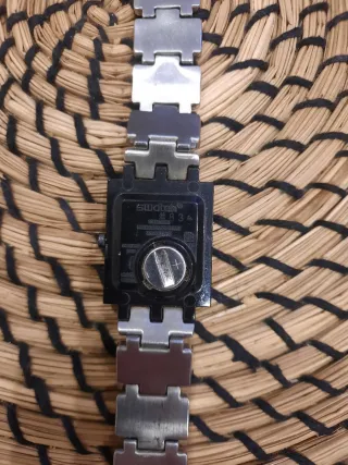 Reloj Swatch Negro y Plateado