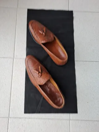 Zapatos de vestir de cuero trenzado.Sele ccion
