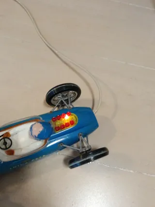 Coche de carreras Lotus Paya antiguo, funcionando