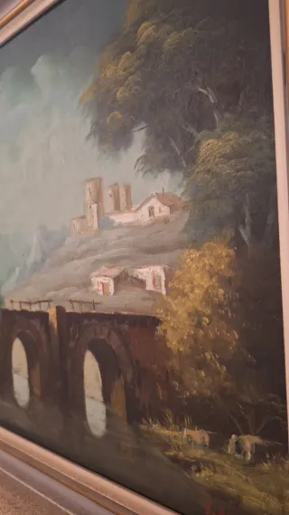 Cuadro de paisaje con puente y pueblo