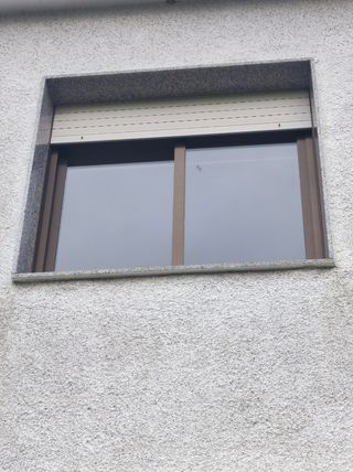 Ventana corredera con persiana