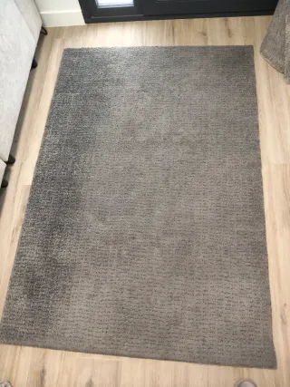 Alfombra gris de tela