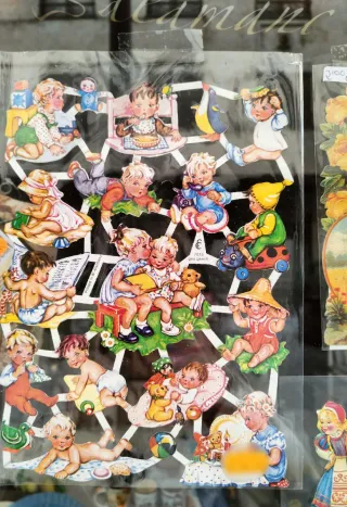 Lámina de cromos troquelados bebés vintage