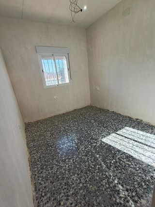 Casa adosada en venta en El Poblado - Abulagar en Puertollano