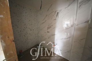 Casa adosada en venta en Tomelloso