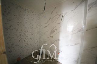 Casa adosada en venta en Tomelloso