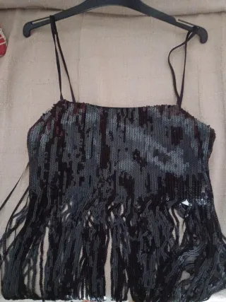 Top lentejuelas con flecos