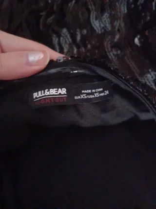 Top lentejuelas con flecos