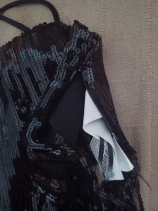 Top lentejuelas con flecos