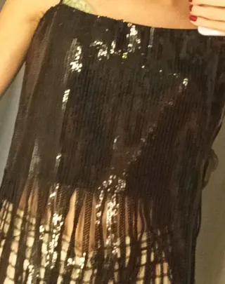 Top lentejuelas con flecos