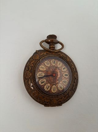 Reloj de pared antiguo estilo bolsillo