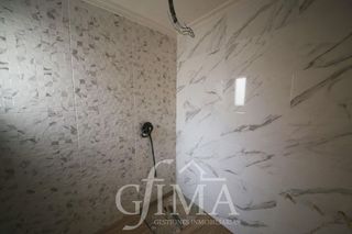 Casa adosada en venta en Tomelloso