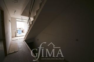 Casa adosada en venta en Tomelloso