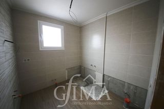 Casa adosada en venta en Tomelloso