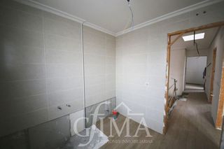 Casa adosada en venta en Tomelloso