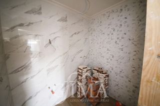 Casa adosada en venta en Tomelloso