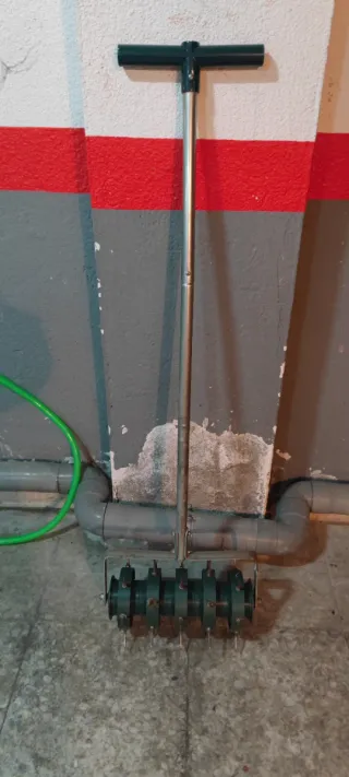 Herramienta para césped.