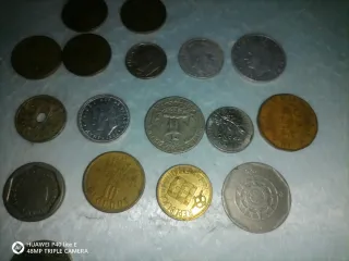 Pequeña colección de monedas españolas y otros