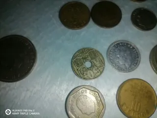Pequeña colección de monedas españolas y otros
