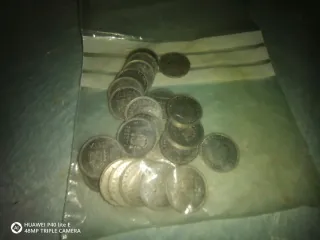 Pequeña colección de monedas españolas y otros