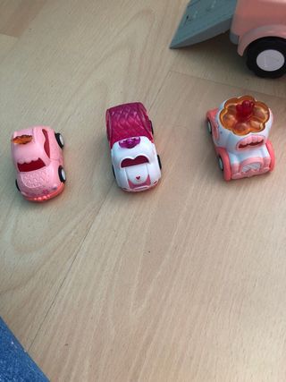 Camión de juguete rosa con música