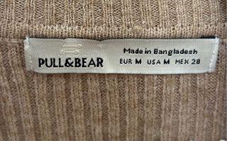 Jersey de punto marrón cuello alto