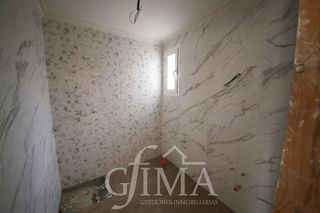 Casa adosada en venta en Tomelloso