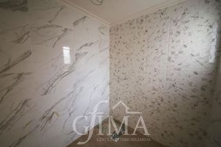 Casa adosada en venta en Tomelloso