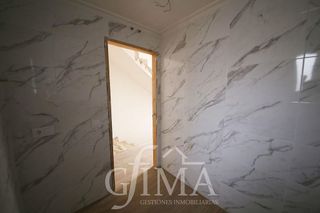 Casa adosada en venta en Tomelloso