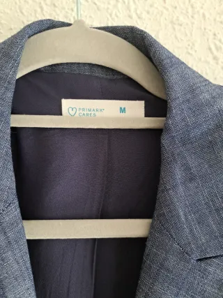 Americana lino con cinturón azul