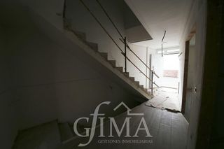 Casa adosada en venta en Tomelloso