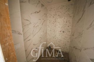 Casa adosada en venta en Tomelloso