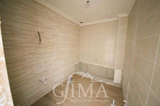 Casa adosada en venta en Tomelloso