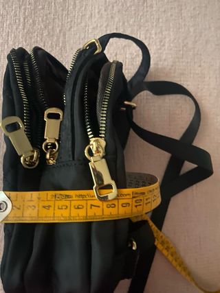 Mochila pequeña acolchada negra