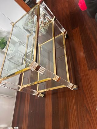 Mesa de centro cristal y metal dorado