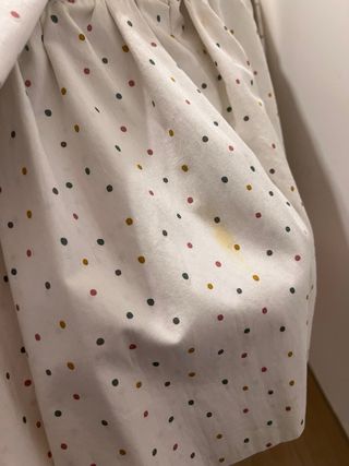 Moisés con ruedas y textil hecho a mano